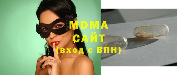 твердый Мегион